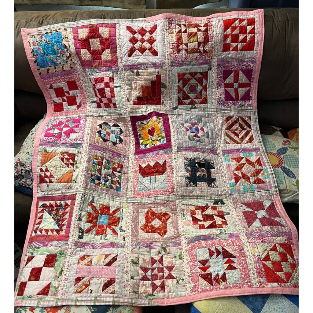 red and white sampler quilt