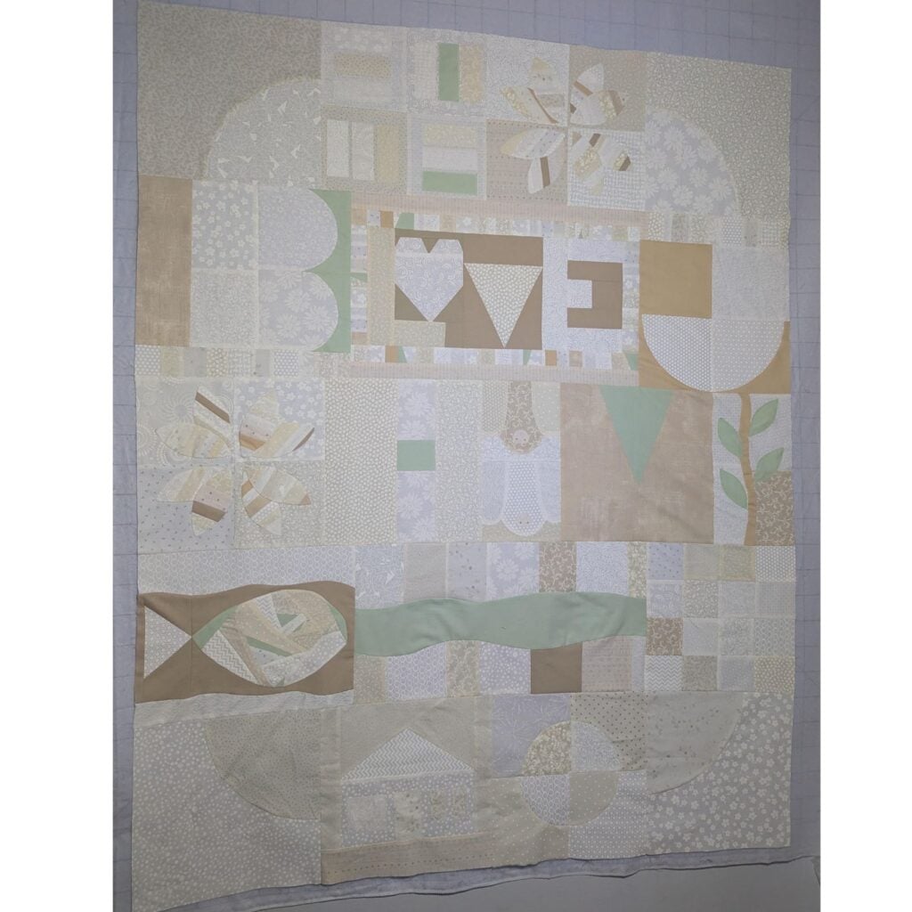 cream and white quilt